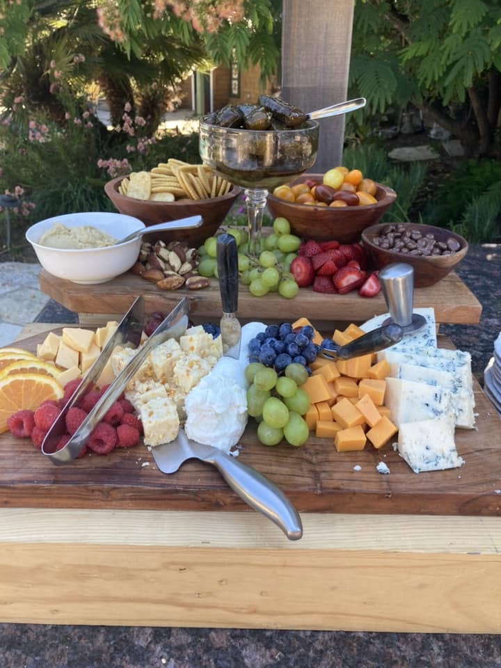 Outdoor tiered cheese and fruit board